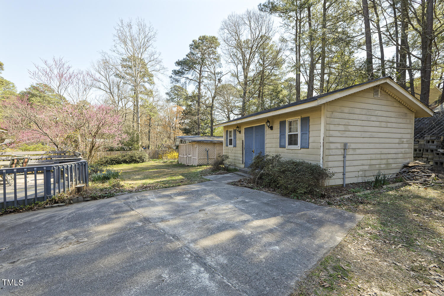 6320 Buffaloe Road Raleigh, NC 27604 - Photo 45 of 50 a view of a house with backyard and trees