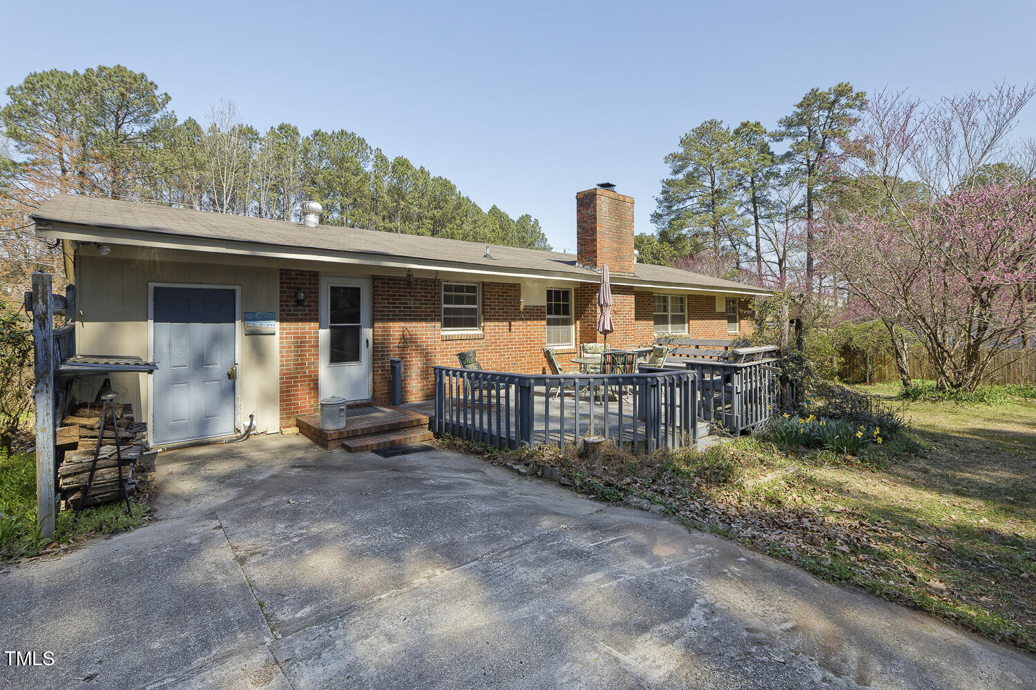 6320 Buffaloe Road Raleigh, NC 27604 - Photo 46 of 50 a view of a house with backyard and sitting area