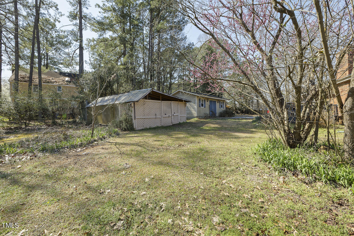 6320 Buffaloe Road Raleigh, NC 27604 - Photo 49 of 50 a view of a backyard with large trees