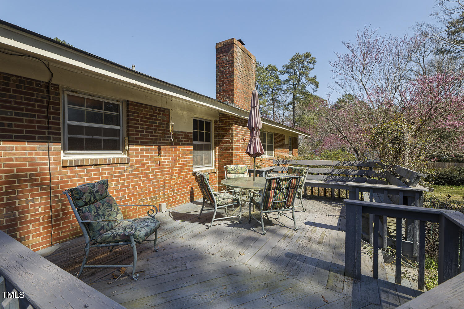 6320 Buffaloe Road Raleigh, NC 27604 - Photo 50 of 50 a backyard of a house with table and chairs