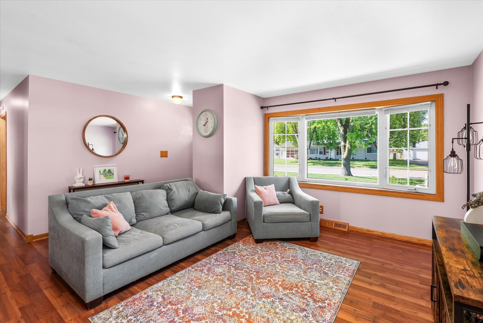 14 Hampton Road Montgomery, IL 60538 - Photo 5 of 27 a living room with furniture and a large window