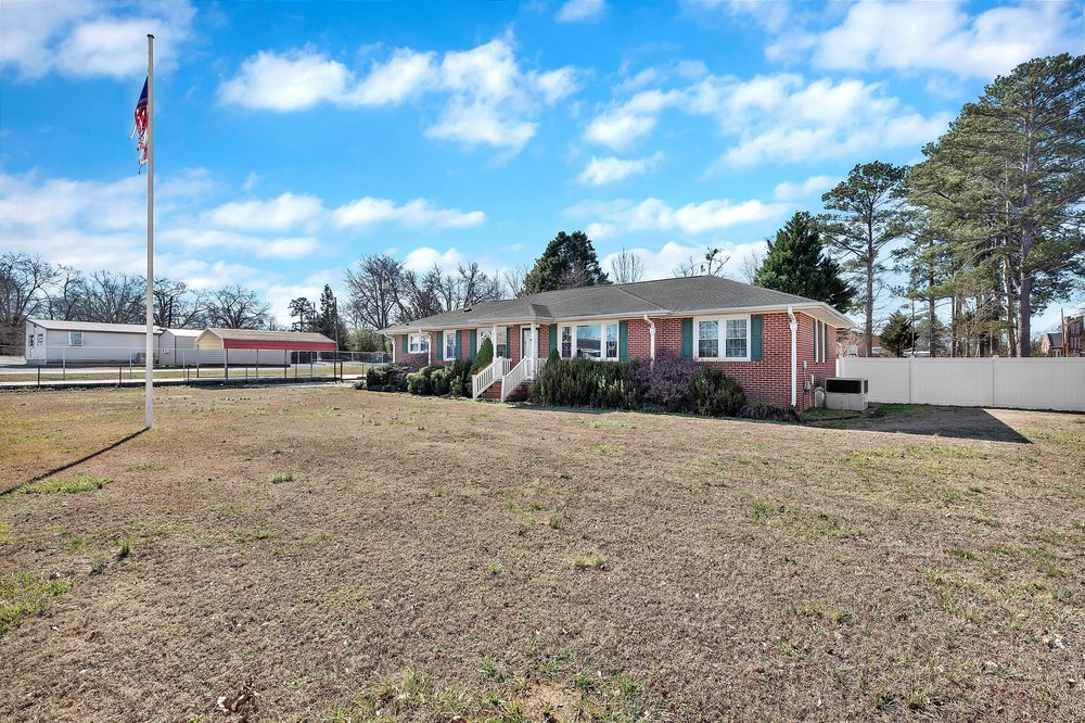 105 West Church Street Iva, SC 29655 - Photo 1 of 25 This classic brick residence boasts a neatly manicured lawn and inviting curb appeal.