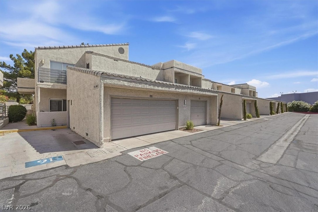 6250 West Flamingo Road, Unit 93 Las Vegas, NV 89103 - Photo 5 of 38 This property features garages for convenient parking and a balcony for outdoor enjoyment.