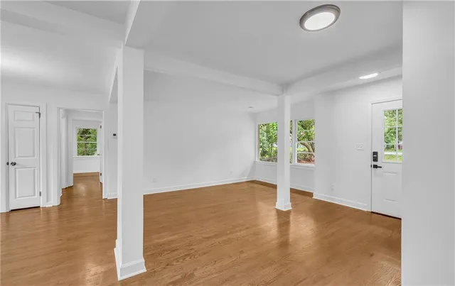 a kitchen with stainless steel appliances granite countertop a stove a sink and a granite counter tops