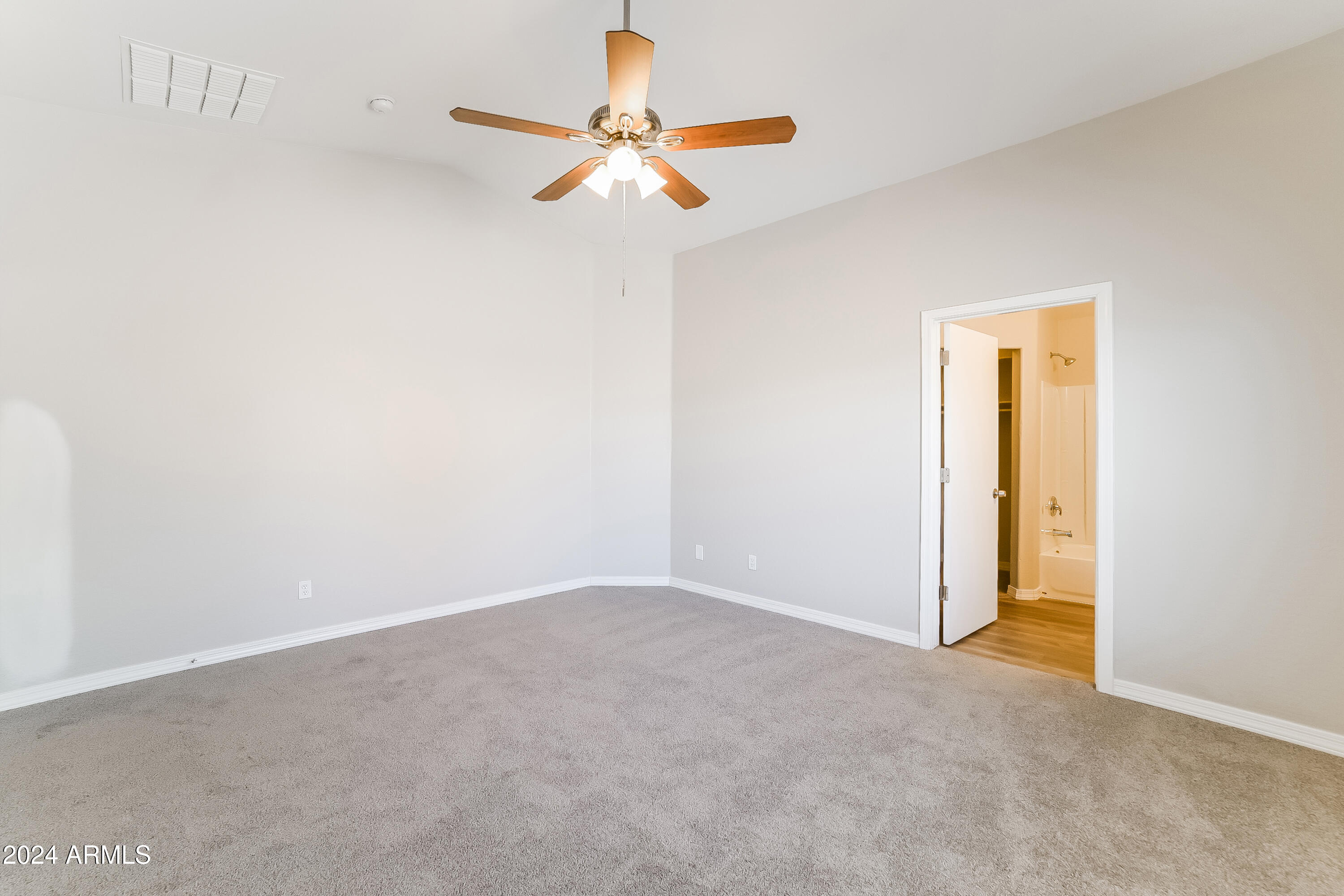 41402 Hopper Drive Maricopa, AZ 85138 - Photo 6 of 16 an empty room
