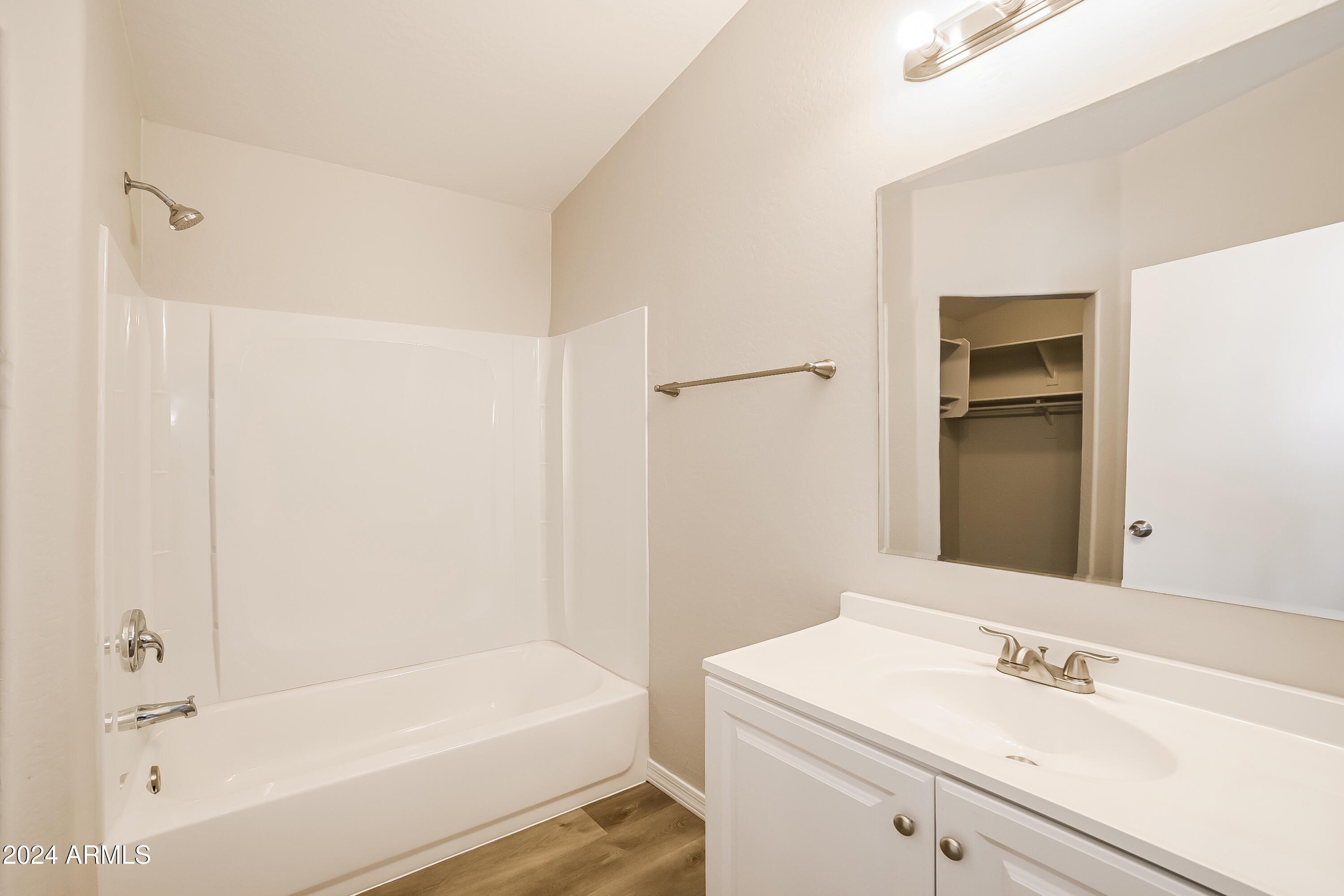 41402 Hopper Drive Maricopa, AZ 85138 - Photo 7 of 16 a bathroom with a bathtub and a sink