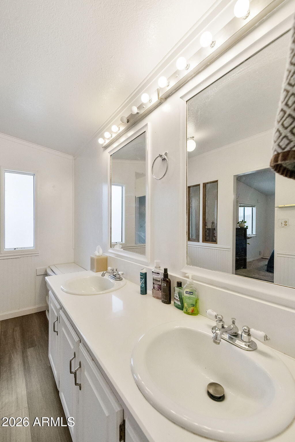 456 South 83rd Way Mesa, AZ 85208 - Photo 15 of 40 a bathroom with a sink and a mirror