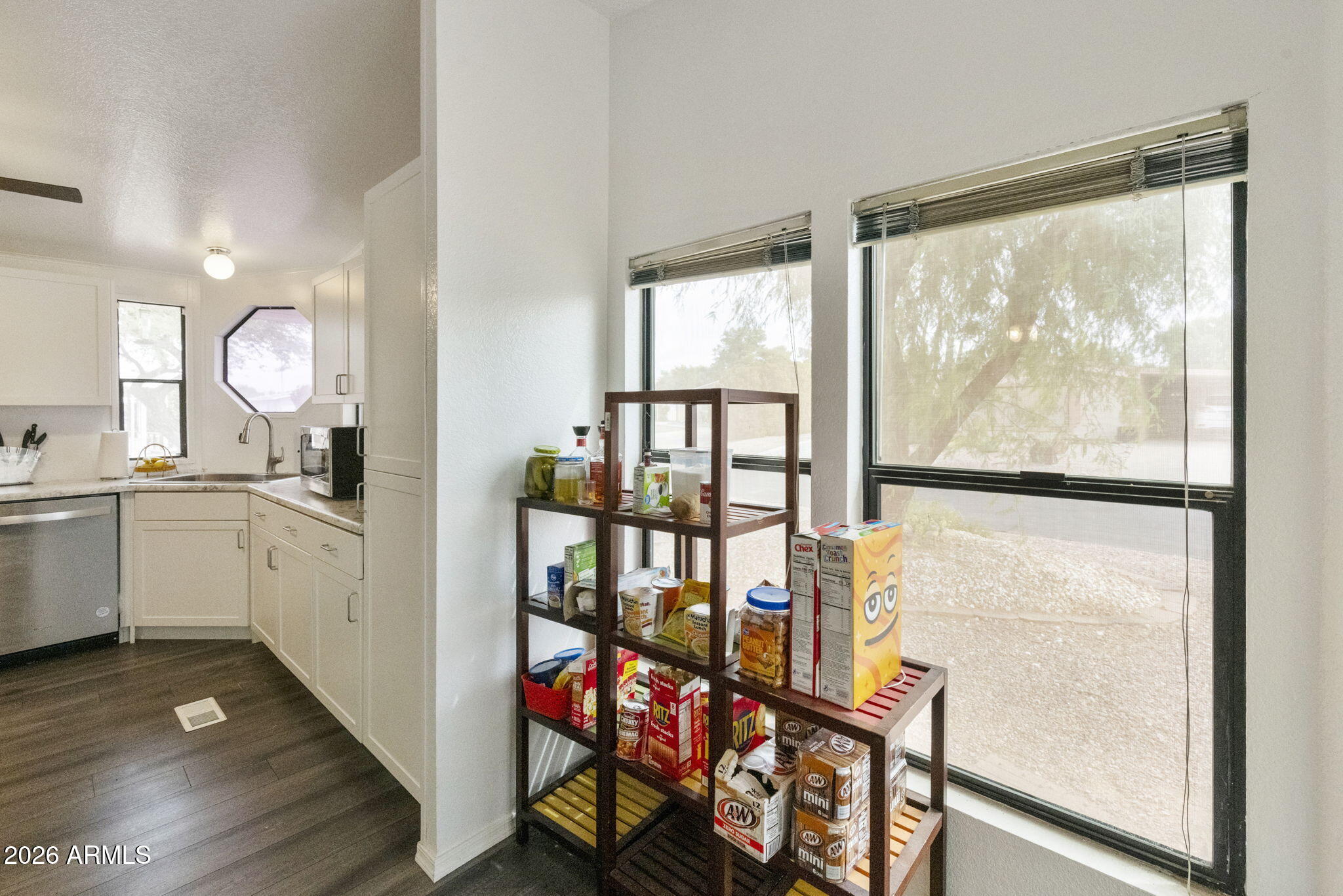 456 South 83rd Way Mesa, AZ 85208 - Photo 8 of 40 a open kitchen with a large window