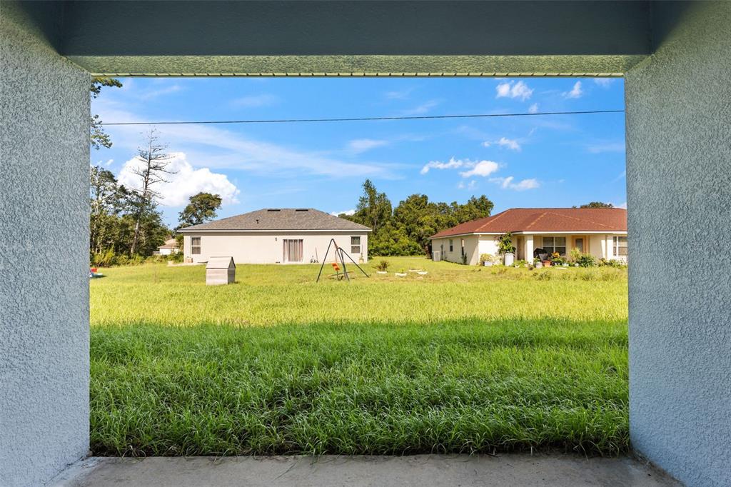3479 Southwest 137th Loop Ocala, FL 34473 - Photo 28 of 32 a view of an outdoor space with a lake view