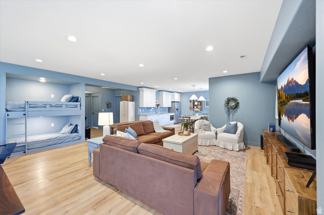 283 North 500 West Mapleton, UT 84664 - Photo 55 of 102 Living room featuring a large tv that can stay with the home.