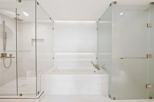 a view of an empty room with a large window