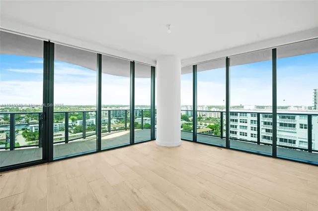 a view of a room with windows