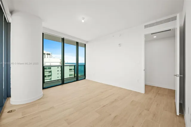 a view of a room with natural light