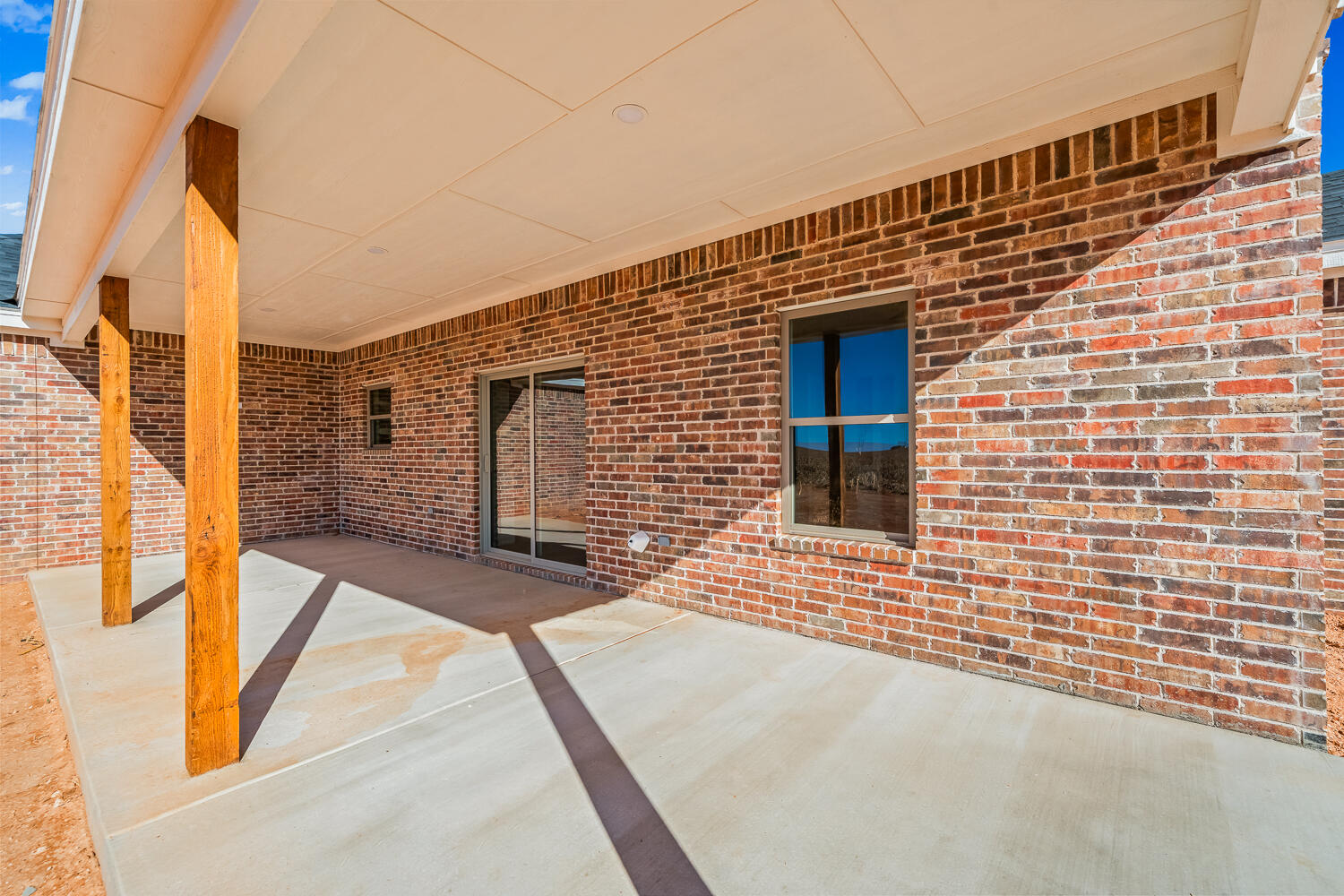 4062 Hawk Road Ropesville, TX 79358 - Photo 45 of 45 a view of a brick house with many windows