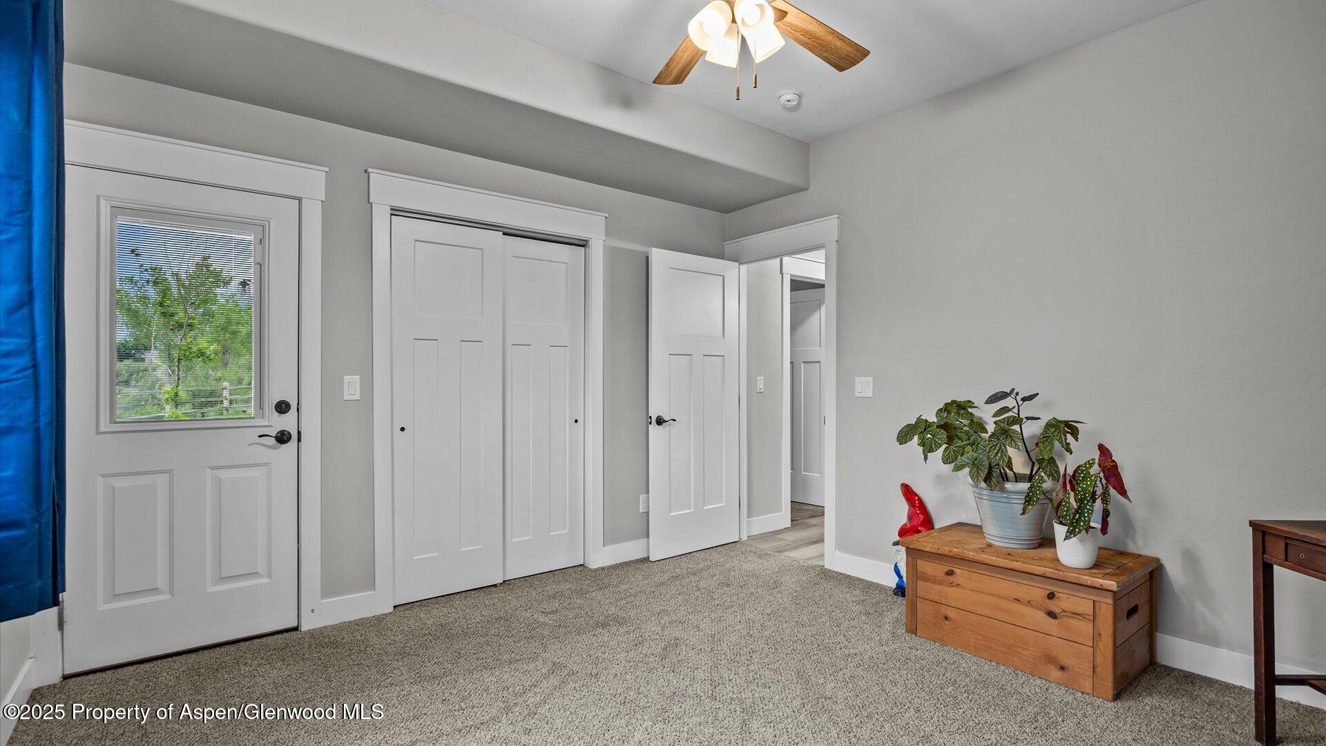 137 Willow Circle Rifle, CO 81650 - Photo 17 of 25 a room with furniture and a potted plant