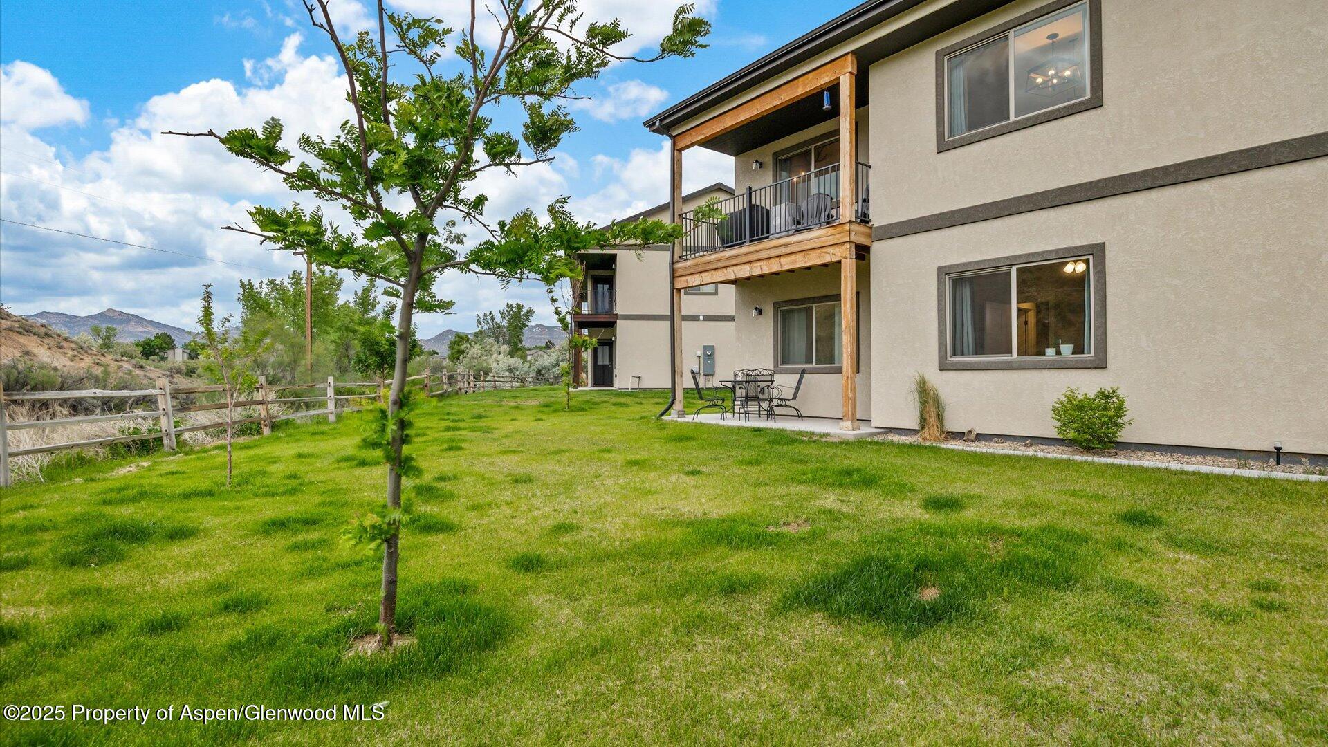 137 Willow Circle Rifle, CO 81650 - Photo 25 of 25 a view of a house with backyard and garden