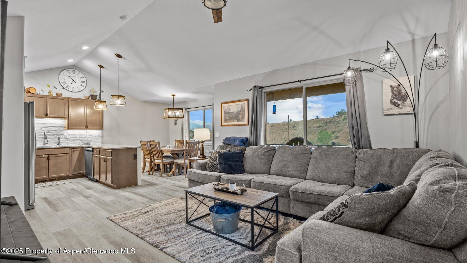 137 Willow Circle Rifle, CO 81650 - Photo 4 of 25 a living room with furniture and a large window