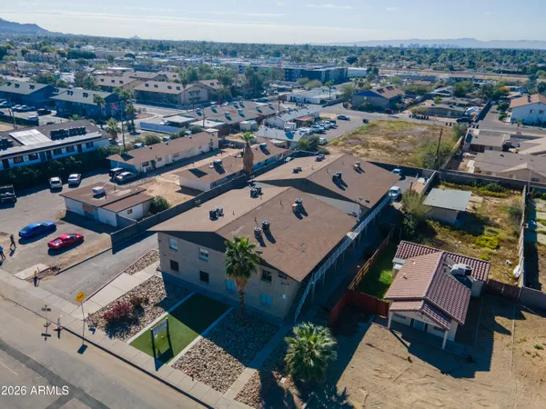 an aerial view of a house with a garden