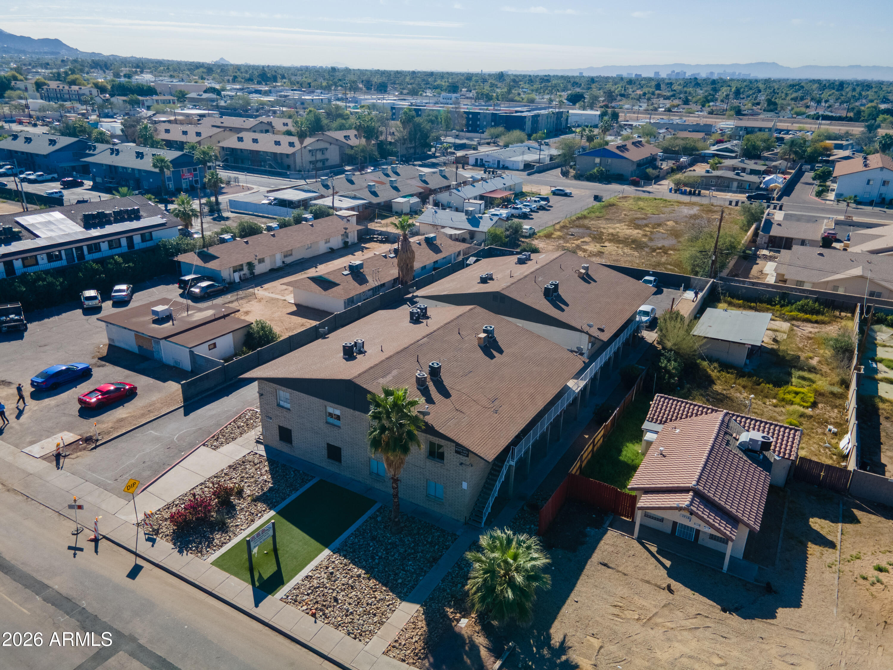 1709 West Mountain View Road Phoenix, AZ 85021 - Photo 11 of 13 an aerial view of a house with a garden