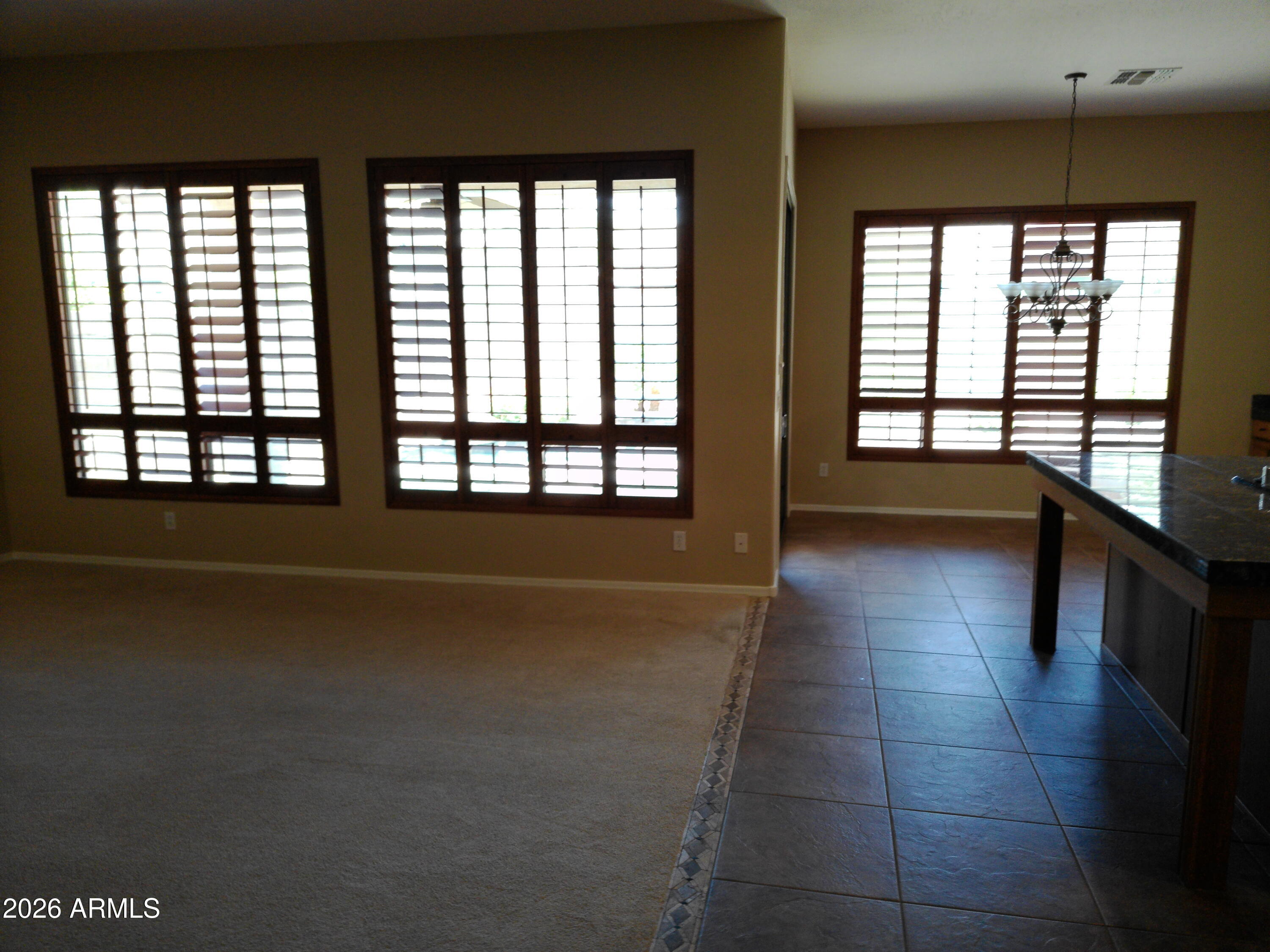 3018 West Sentinel Rock Road Phoenix, AZ 85086 - Photo 10 of 16 a view of an empty room with a window