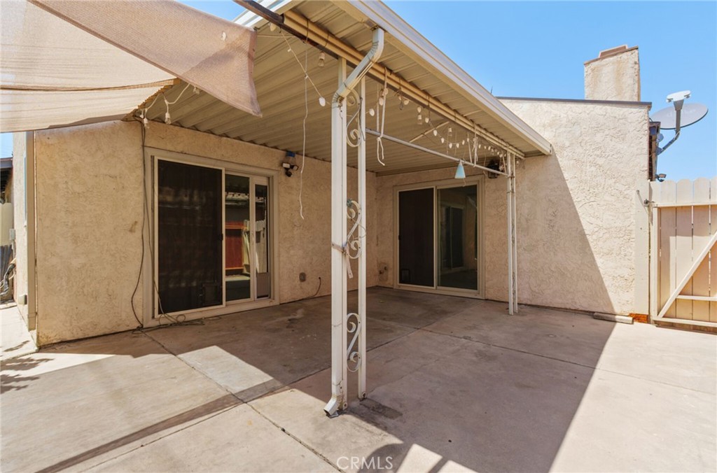 29368 Murrieta Road Menifee, CA 92586 - Photo 17 of 20 a view of a house with a door
