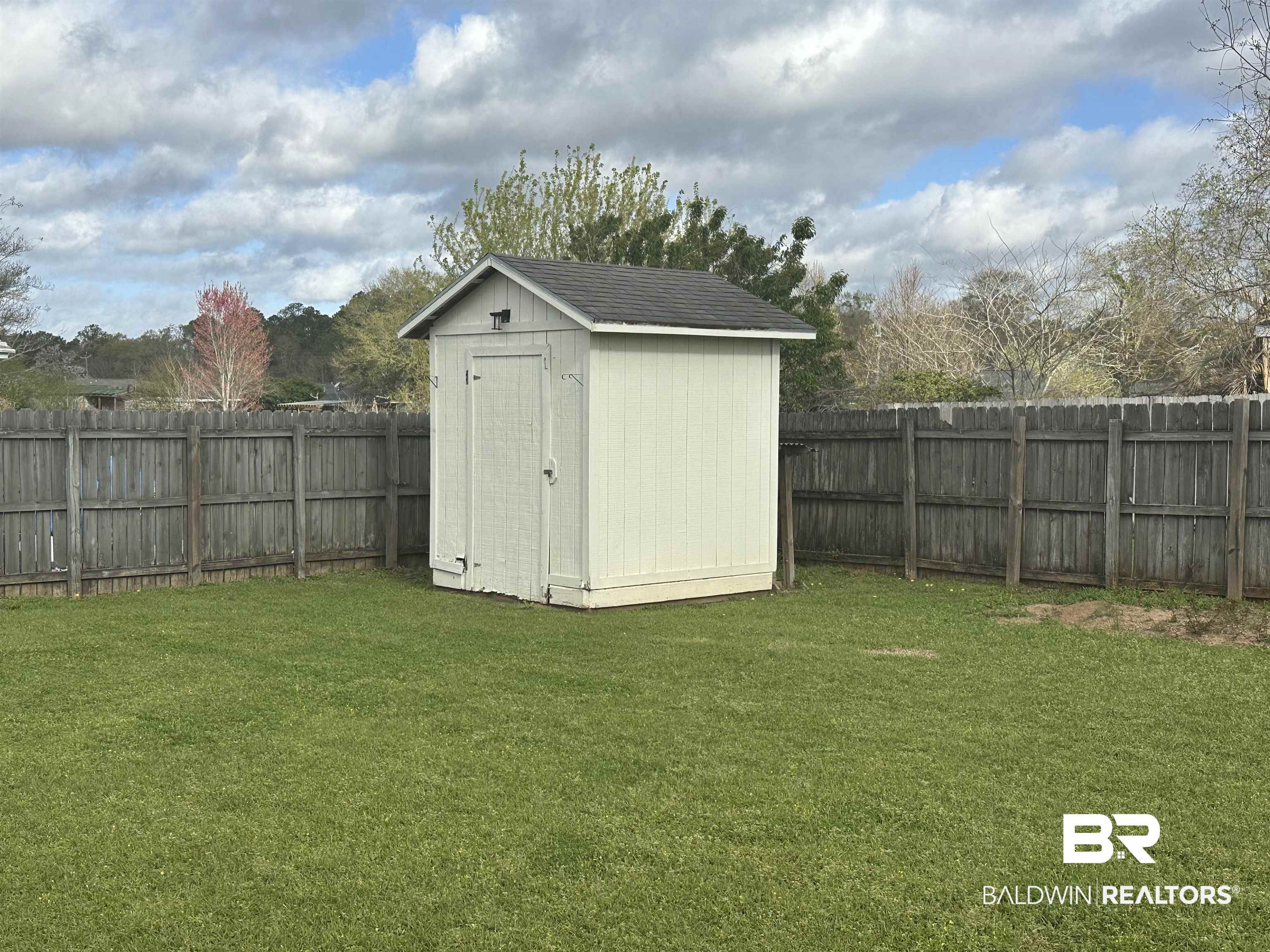 4882 Rebecca Place Mobile, AL 36695 - Photo 12 of 29 View of shed with a fenced backyard