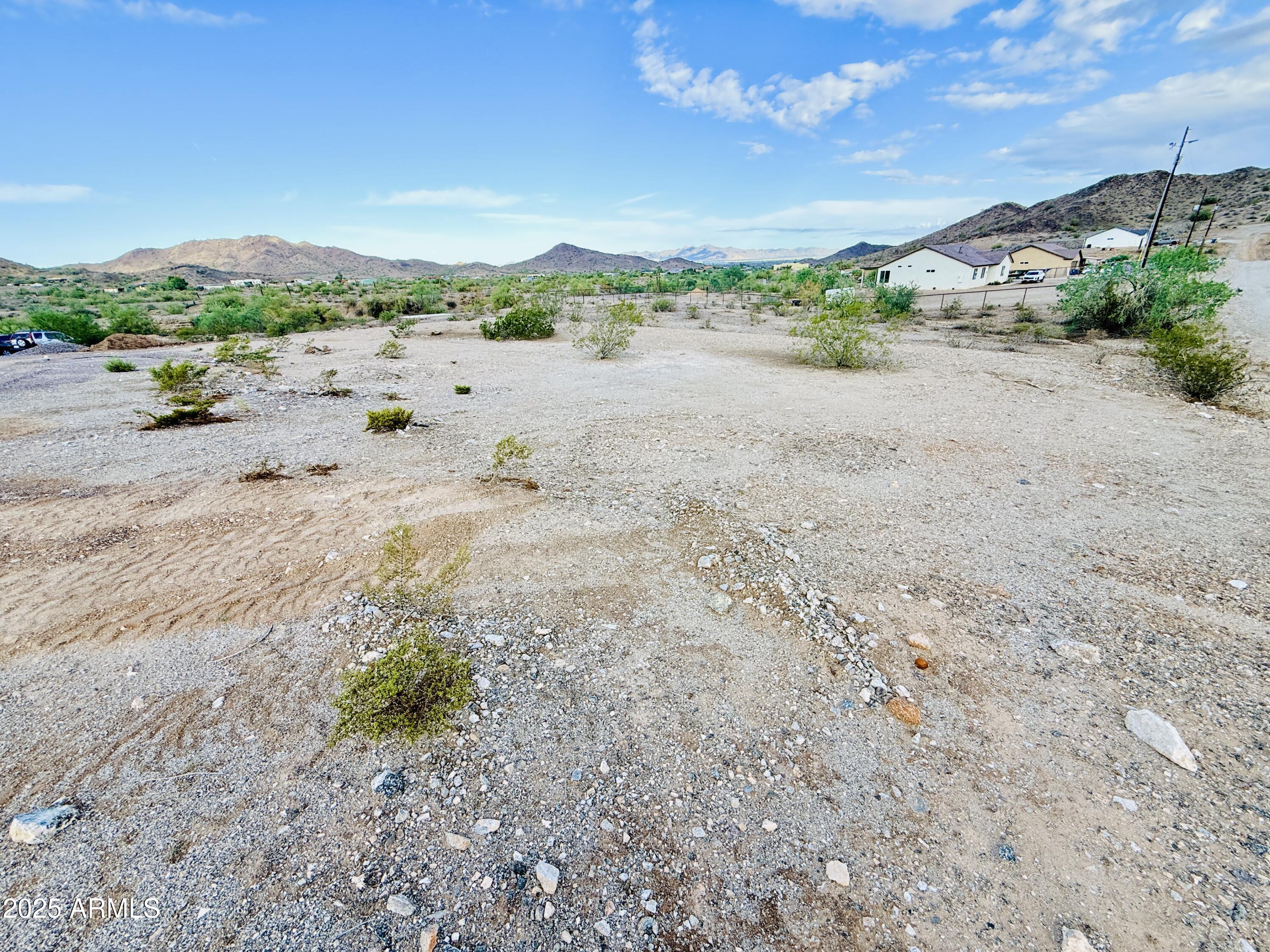 9080 South 138th Avenue Goodyear, AZ 85338 - Photo 11 of 20 a view of a road with a beach