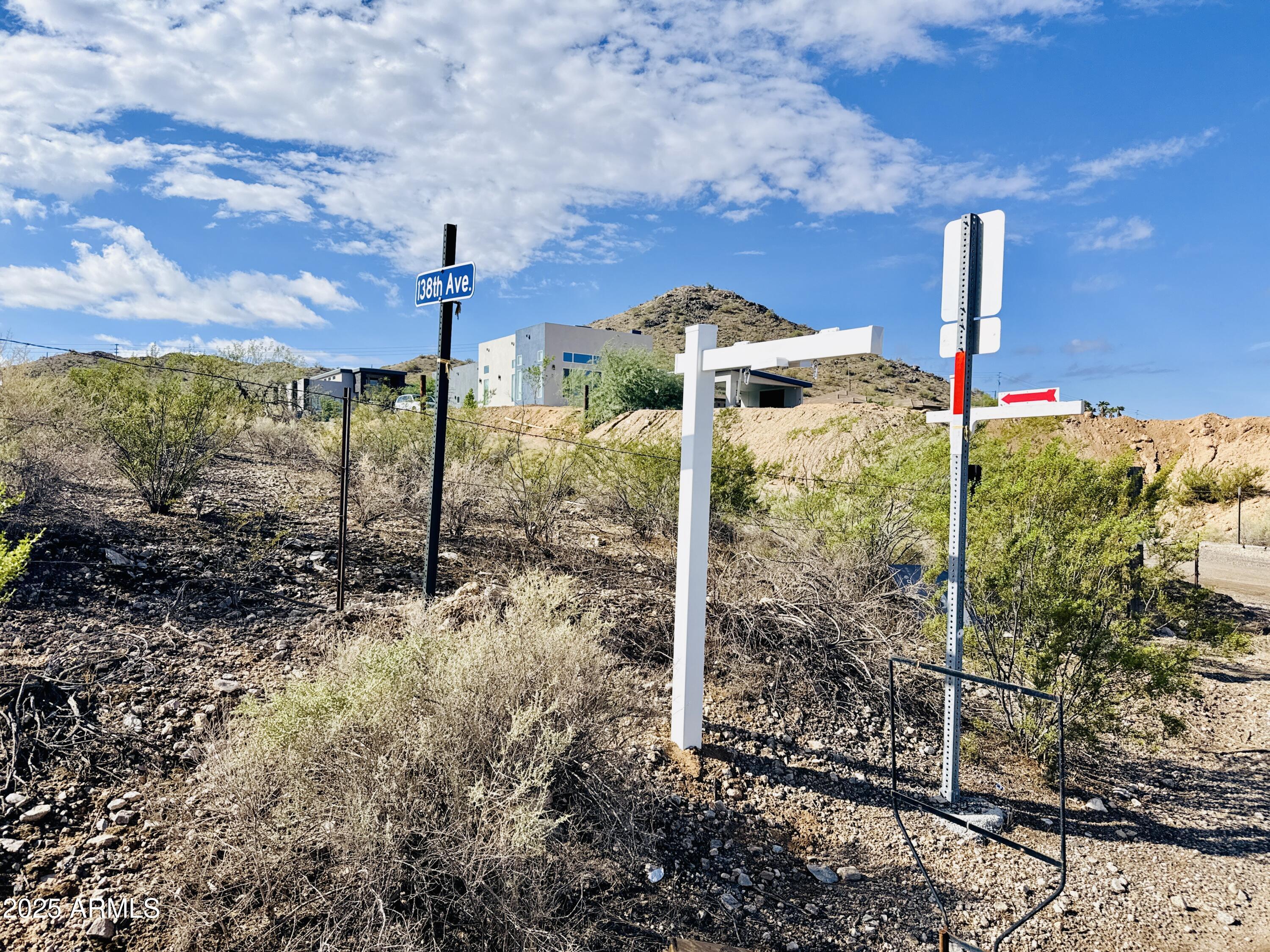 9080 South 138th Avenue Goodyear, AZ 85338 - Photo 20 of 20 a front view of a house with a yard