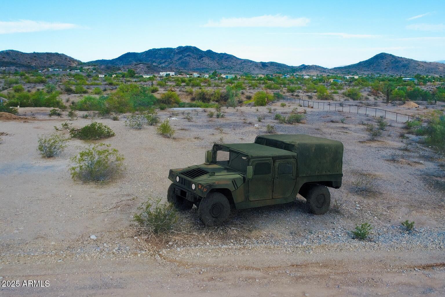 9080 South 138th Avenue Goodyear, AZ 85338 - Photo 2 of 20 a view of a lake in middle of the town