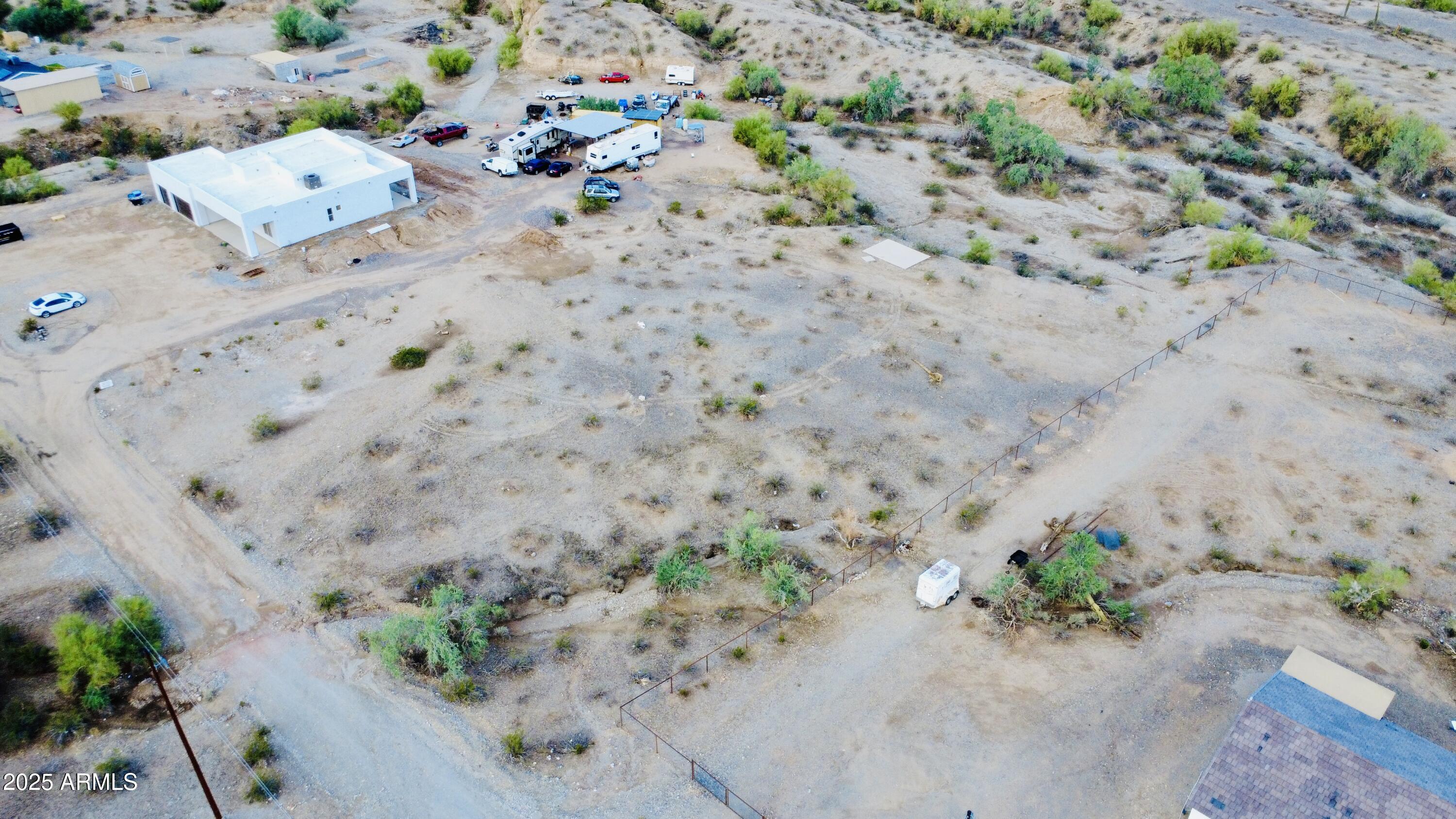 9080 South 138th Avenue Goodyear, AZ 85338 - Photo 7 of 20 an aerial view of a house with a beach