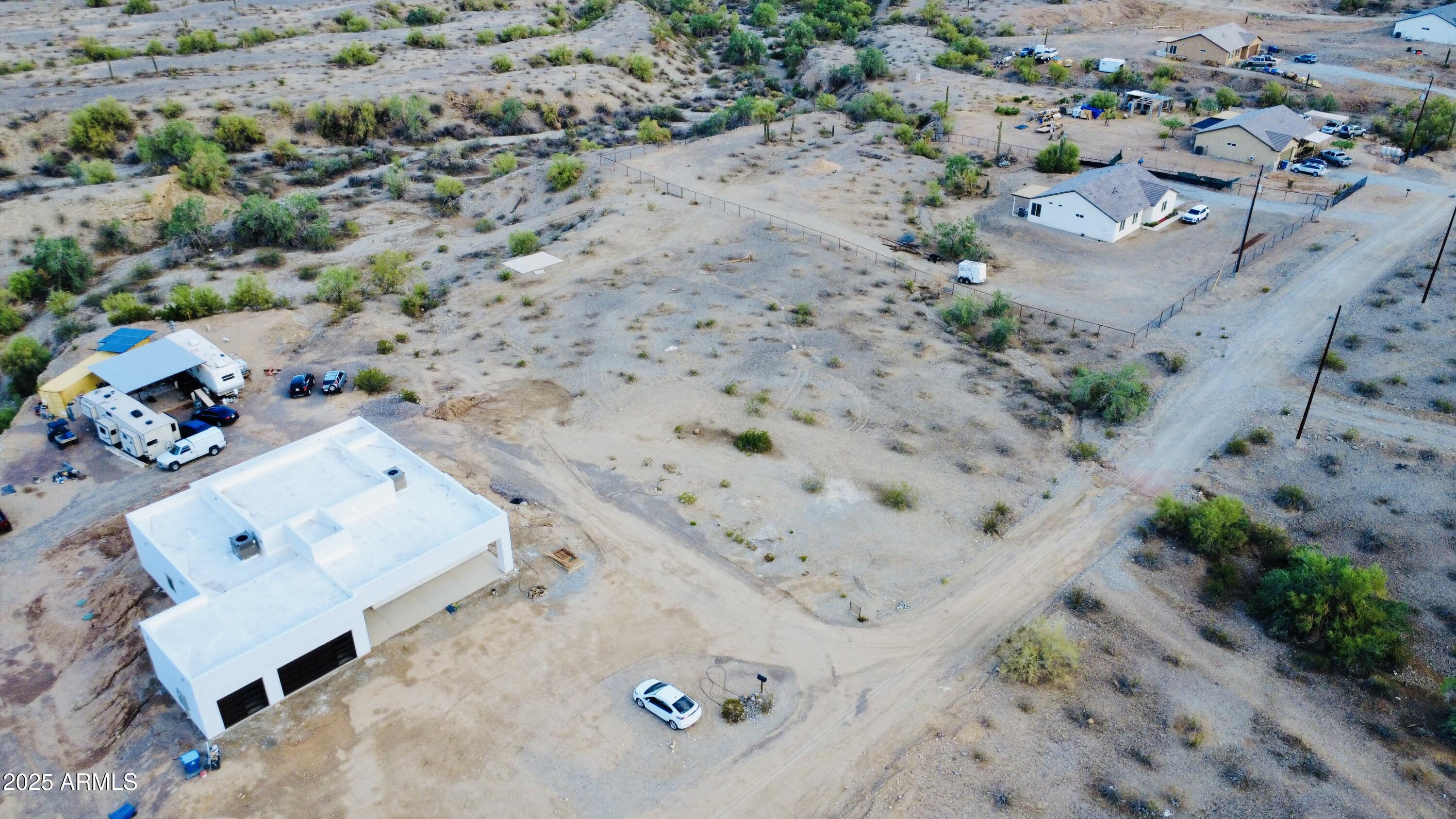 9080 South 138th Avenue Goodyear, AZ 85338 - Photo 8 of 20 an aerial view of a house with a yard
