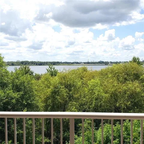 a view of a lake from a balcony