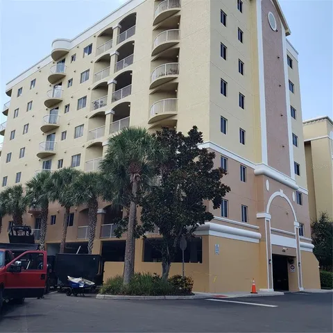 a front view of a building with parking space