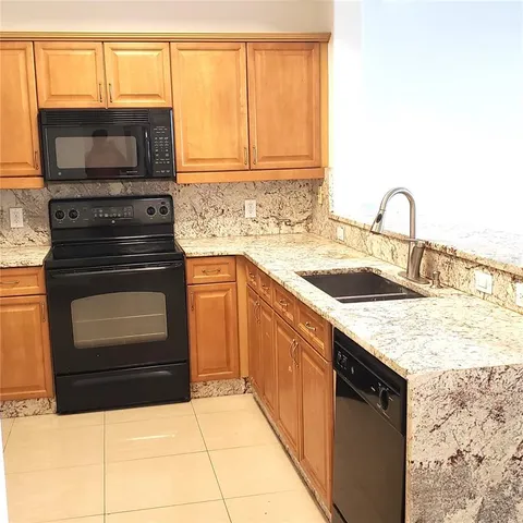 a view of a storage & utility room with washer and dryer