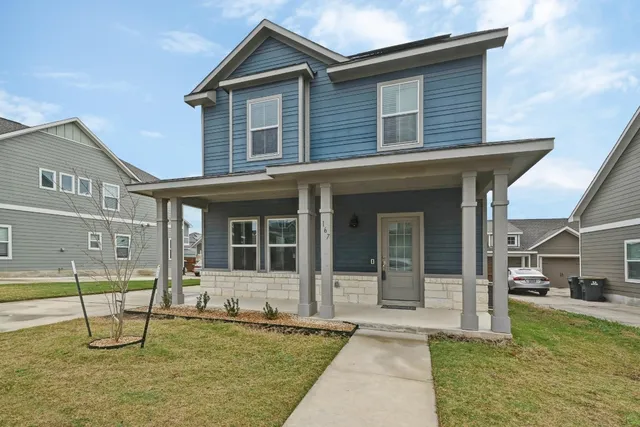 a view of a house with a swimming pool