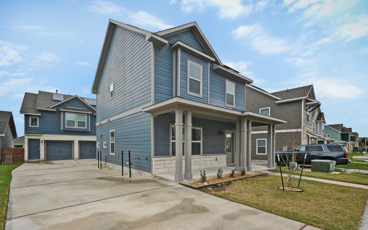 167 Rioja Kyle, TX 78640 - Photo 3 of 26 a front view of a house with garden