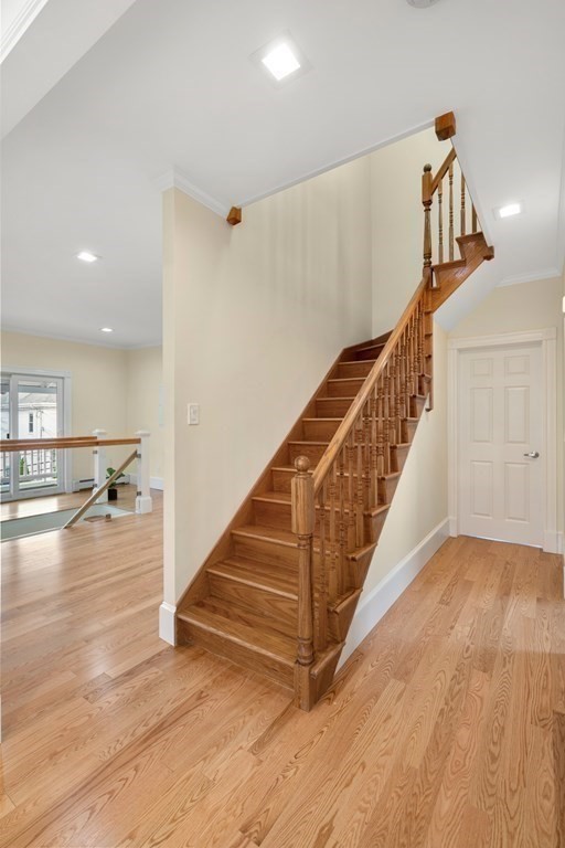 88 Coolidge Street, Unit 2 Brookline, MA 02446 - Photo 11 of 14 a view of entryway and hall with wooden floor