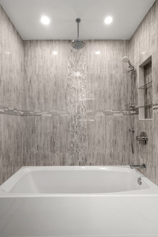 88 Coolidge Street, Unit 2 Brookline, MA 02446 - Photo 10 of 14 a bathroom with a shower and a bath tub