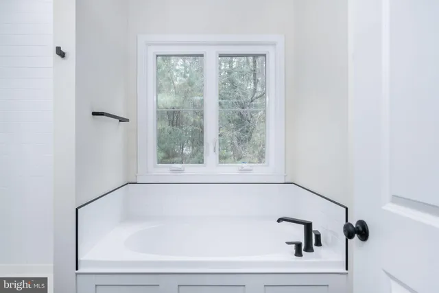 a bathroom with a bathtub