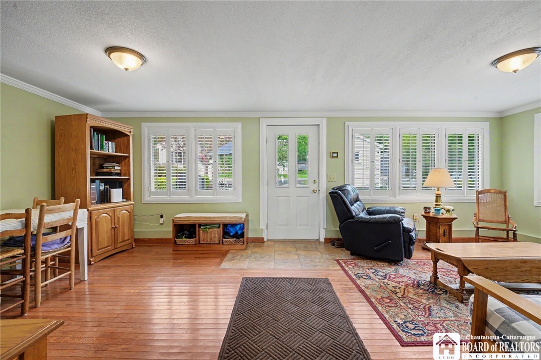 4568 Warners Bay Road Ellery, NY 14712 - Photo 17 of 43 Bright living room with hardwood floors. and a re