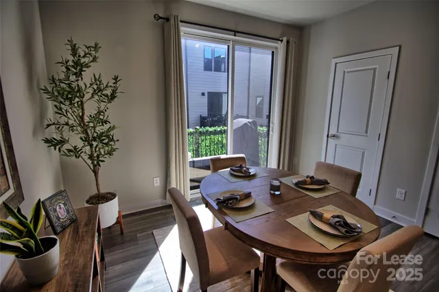 a view of a workspace with furniture