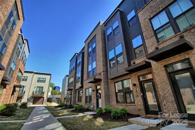 a front view of a multi story residential apartment building