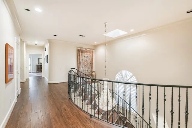 a bathroom with a granite countertop sink and a bathtub