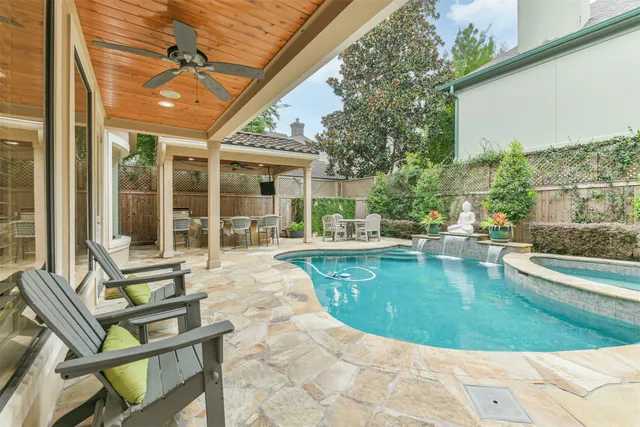 a view of an outdoor space with a table and chairs