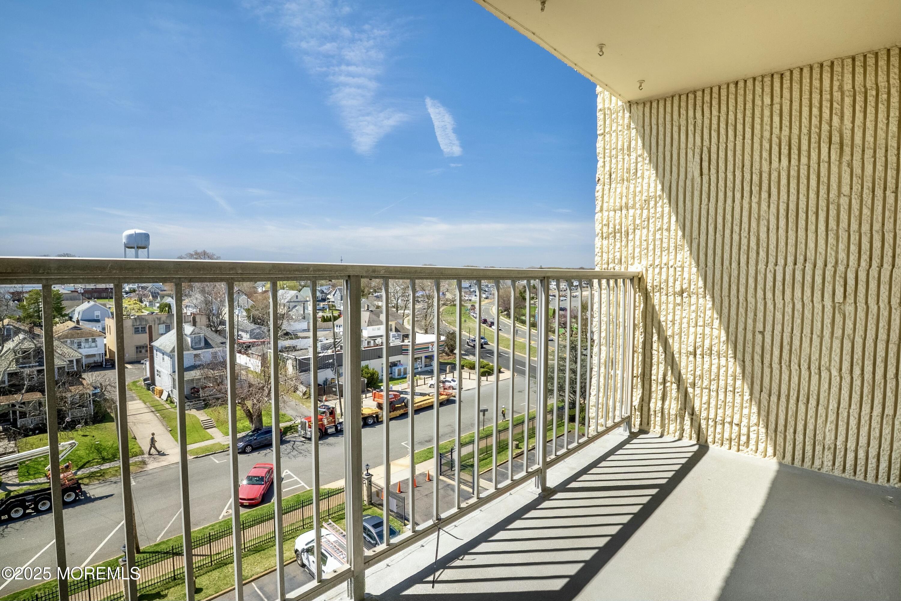 1000 River Road, Unit 6G Belmar, NJ 07719 - Photo 9 of 9 a view of wooden balcony