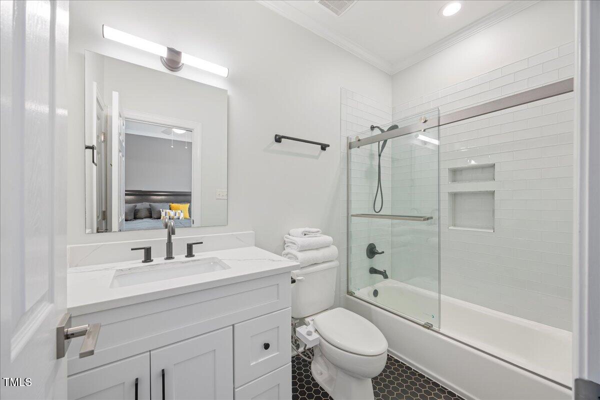 1508 Tradescant Court Raleigh, NC 27613 - Photo 20 of 35 Full Guest Bath floor 2