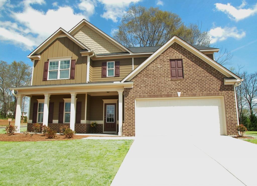 120 Brooks Circle Hampton, GA 30228 - Photo 1 of 1 a view of a yard in front of house