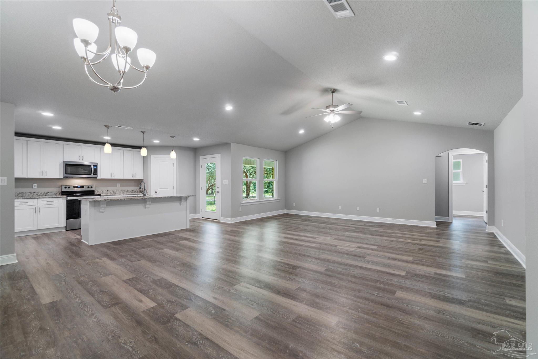 4289 Carl Booker Road Milton, FL 32583 - Photo 14 of 40 a view of kitchen with stove and cabinets