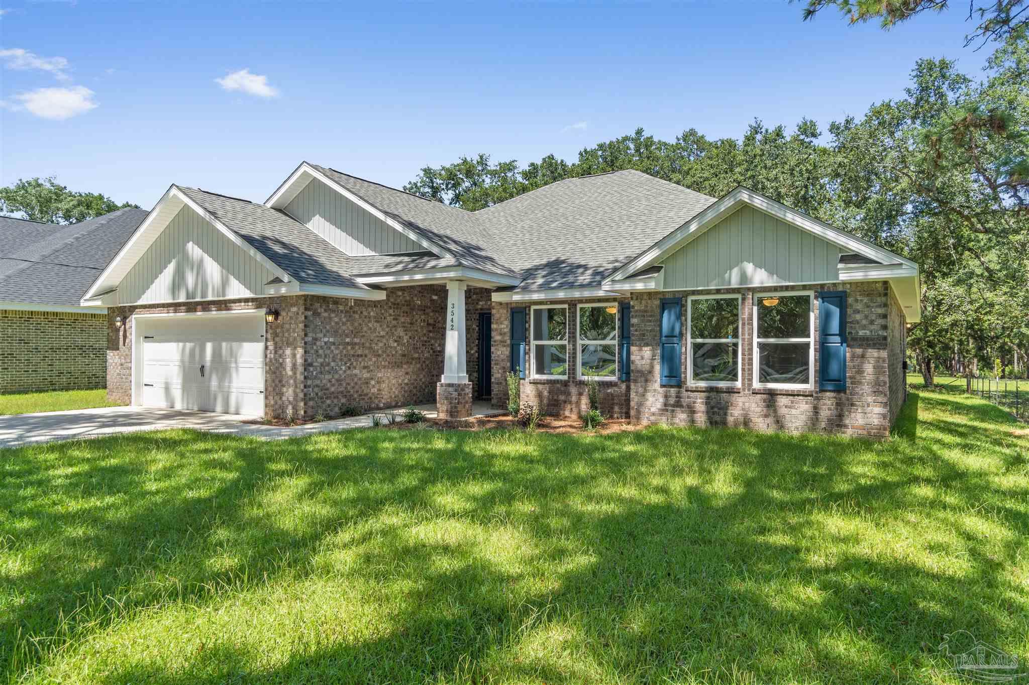 4289 Carl Booker Road Milton, FL 32583 - Photo 3 of 40 a big house with a big yard and more windows