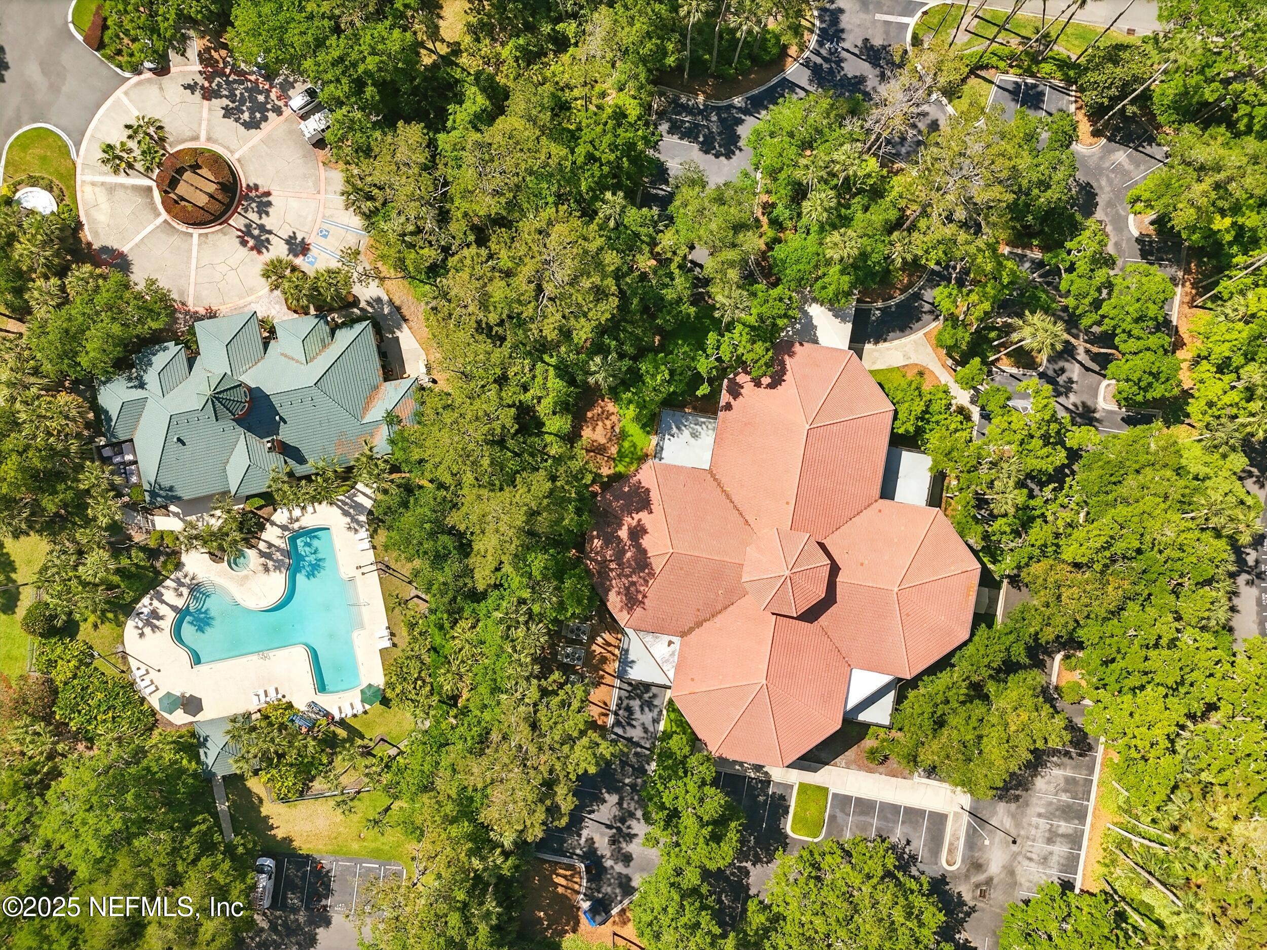150 Veracruz Drive, Unit 537 Ponte Vedra Beach, FL 32082 - Photo 14 of 14 an aerial view of a house with a yard and garden